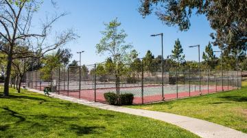 Tennis courts at a park.