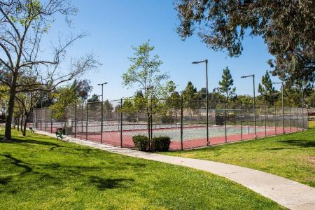 Tennis courts at a park.